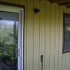 the lanai wall before us